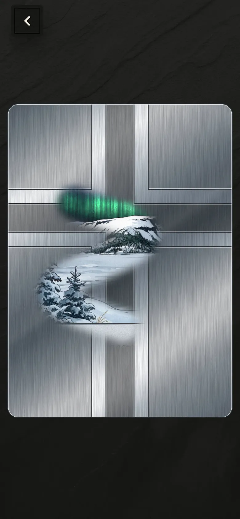 A card under its silver cover, half rubbed off to show the northern lights beneath